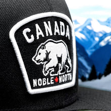 Load image into Gallery viewer, Noble North - Canada Badge - Black New Era 9Fifty Snapback - Close Up
